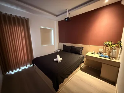 Deluxe Double Room with Balcony — KELLY Thao Dien Hotel & Apartment