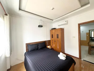 Queen Room with Balcony — KELLY Thao Dien Hotel & Apartment